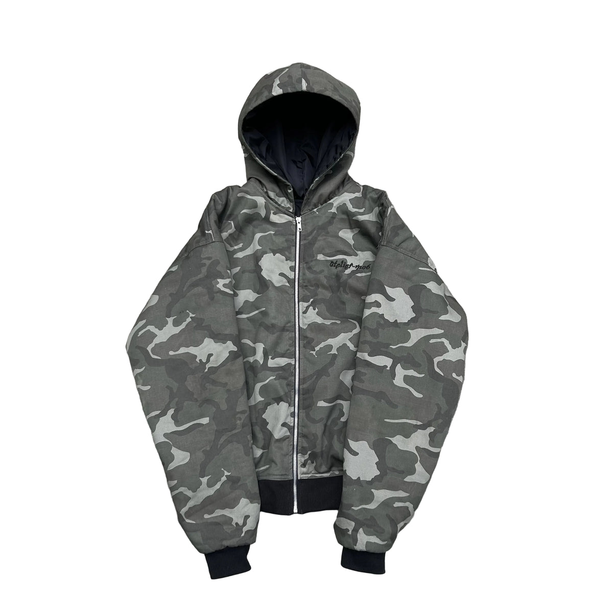 Atelier-mo6 reversible jacket – camo side, flat lay