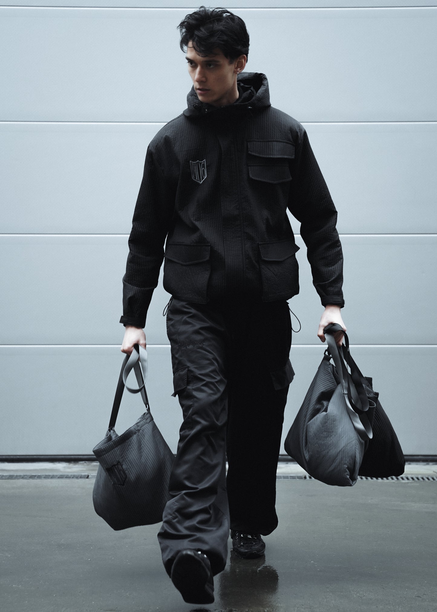 MULTIFUNCTIONAL JACKET/BAG (BLACK)
