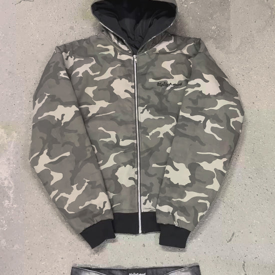 Reversing the jacket and water test on the black Prada nylon side
