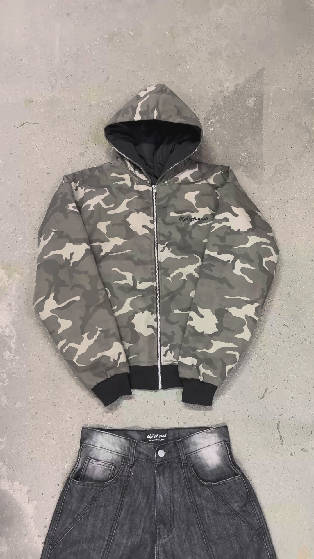 Reversing the jacket and water test on the black Prada nylon side